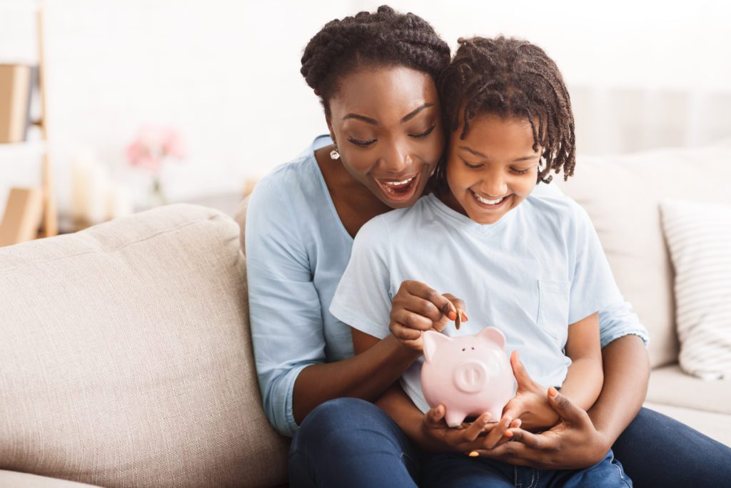 Mum Kids and a Piggy Bank Kids saving!