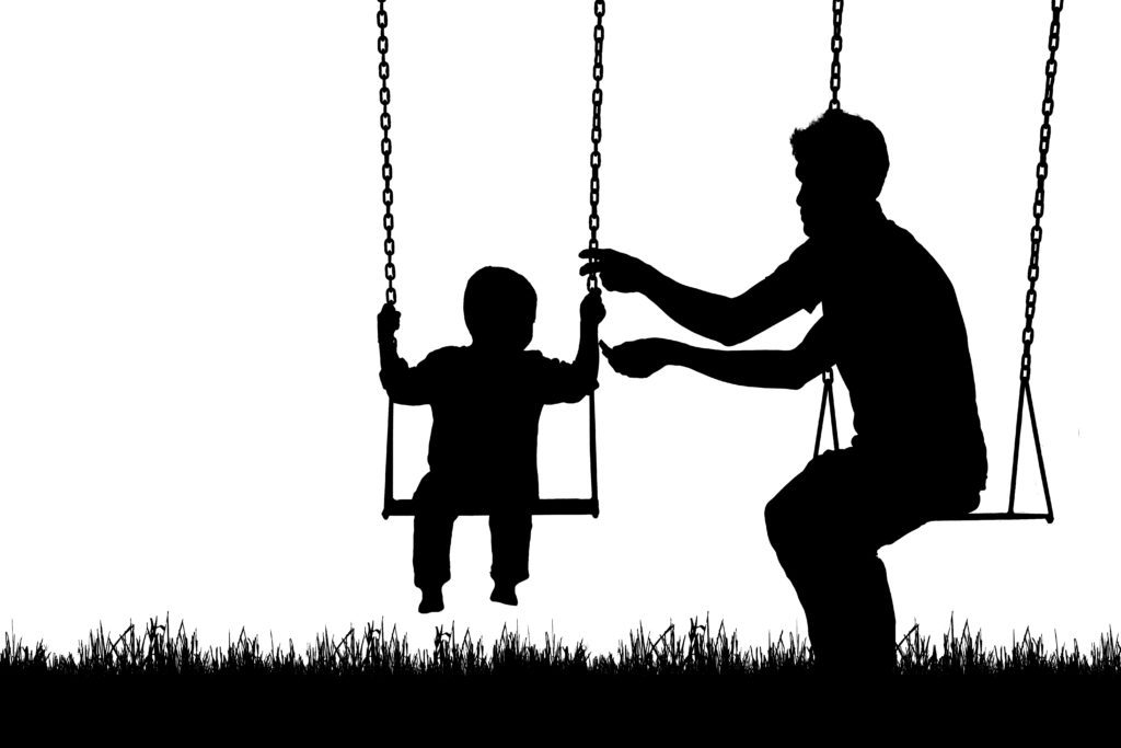 Silhouette,Father,And,Son,Happy,In,Playground,On,White,Background Child playing with dad on a swing silhouette