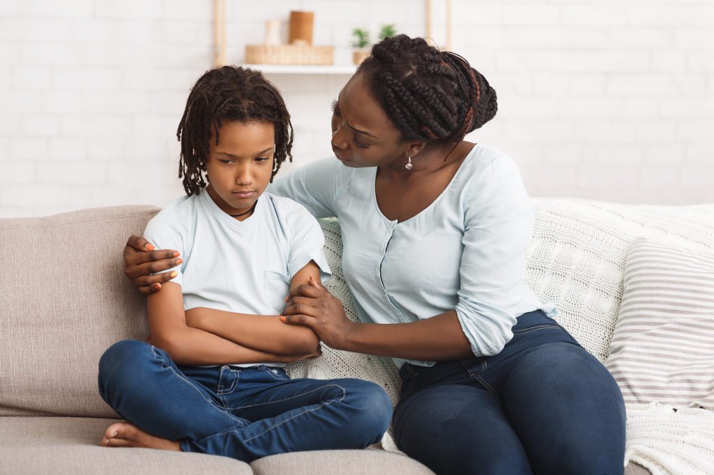 African,Mother,Apologizing,To,Her,Offended,Daughter,After,Quarrel,On Mom and daughter