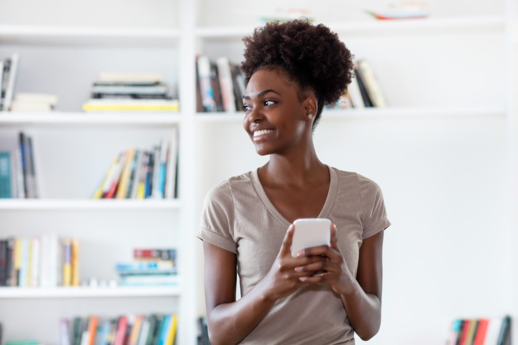 African,American,Young,Adult,Man,Shopping,Online,With,Mobile,Phone African,American,Young,Adult,Man,Shopping,Online,With,Mobile,Phone